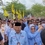 Ribuan Relawan dan Masyarakat Iringi Mawardi dan Anita Daftar Cagub dan Cawagub ke KPU Sumatra Selatan